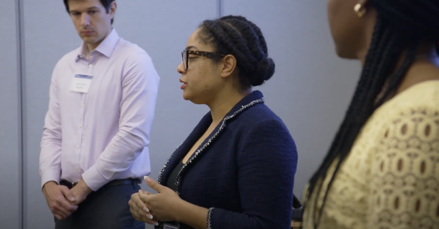 person presenting with two people listening